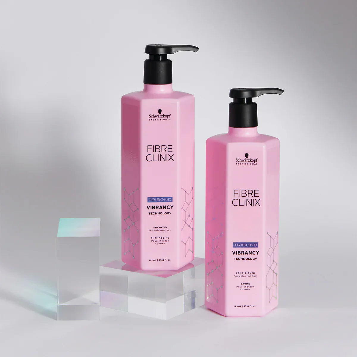 Pink Schwarzkopf Professional Fibre Clinix hair care product bottles in a stylish collection.