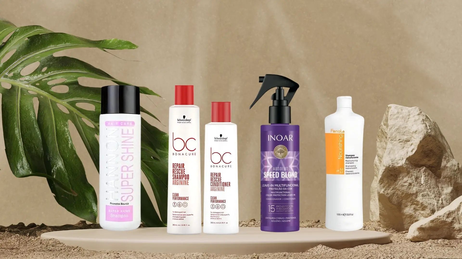 Collection of Hannon hair styling products with tropical leaf accent.