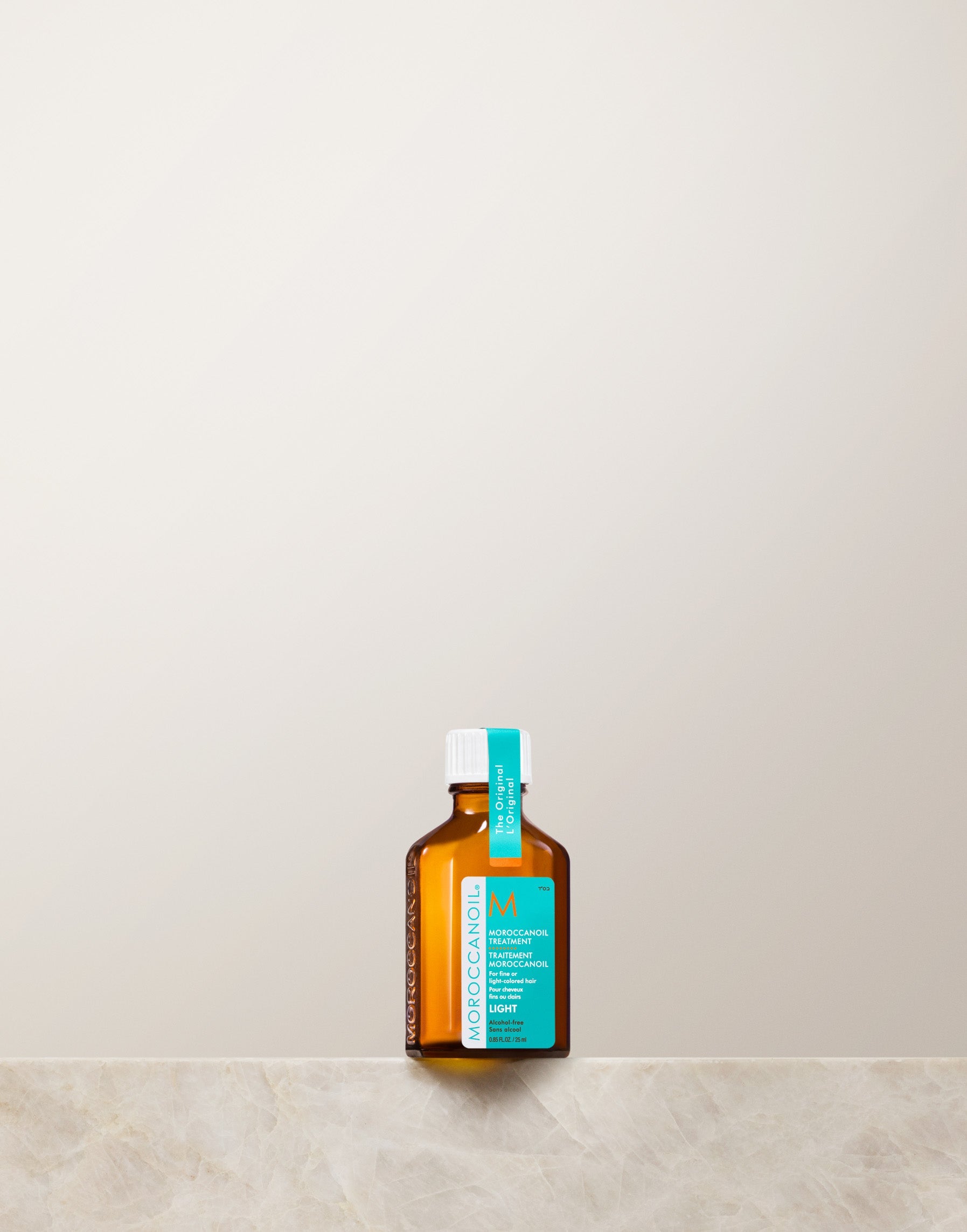 Moroccanoil Light Treatment 25ml bottle — official product shot of the iconic golden treatment oil for fine hair