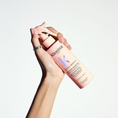 Kerastase Gloss Absolu Anti-Frizz Spray: Smooth, Shiny Hair Solution. View product details & shop now!
