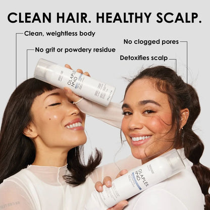 Hair care product advertisement showing bottles of scalp treatment or shampoo.