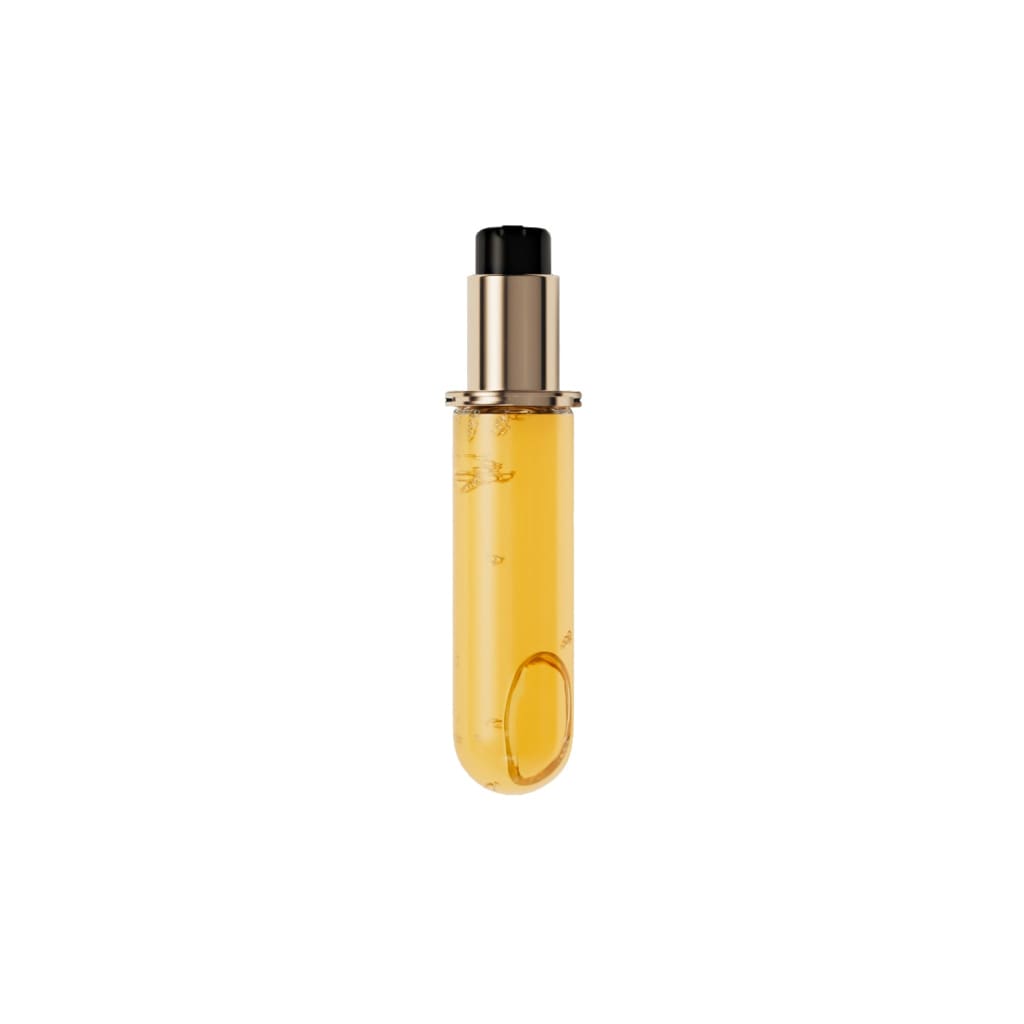 Glass vial containing yellow liquid with a gold-colored cap and base.