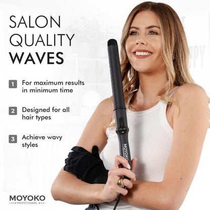 Hair styling wand or curling iron held by a smiling woman in a white top.