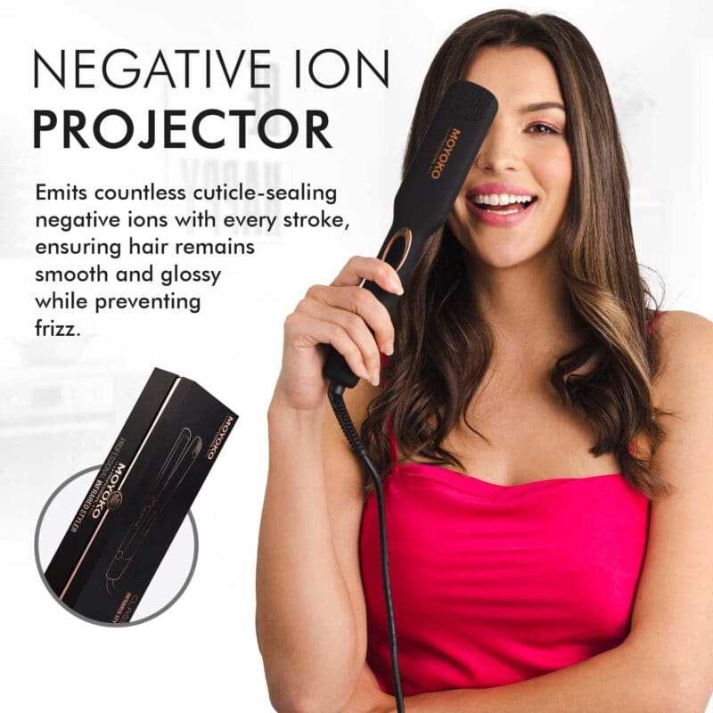 Negative ion hair styling tool held by a smiling woman in a red top.