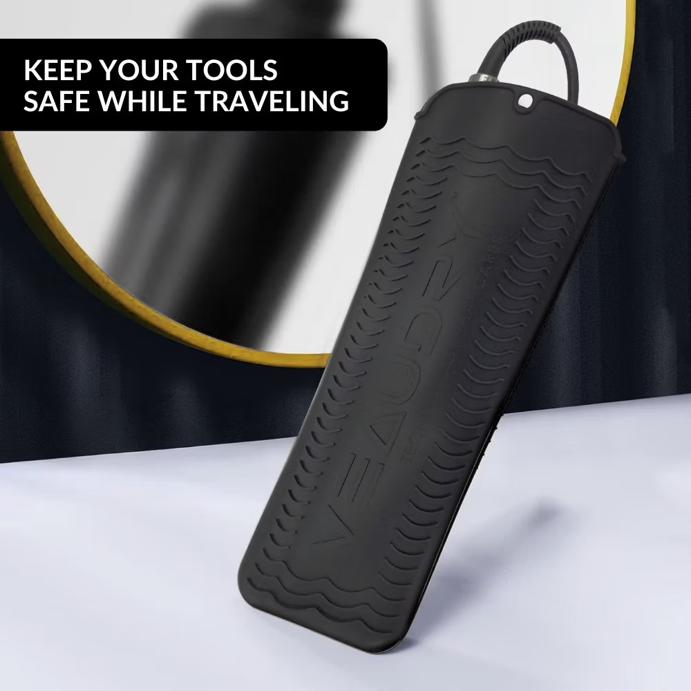 Veaudry Heat Mat Pouch shown in travel use, offering heat-resistant protection for hair tools with sleek black design.