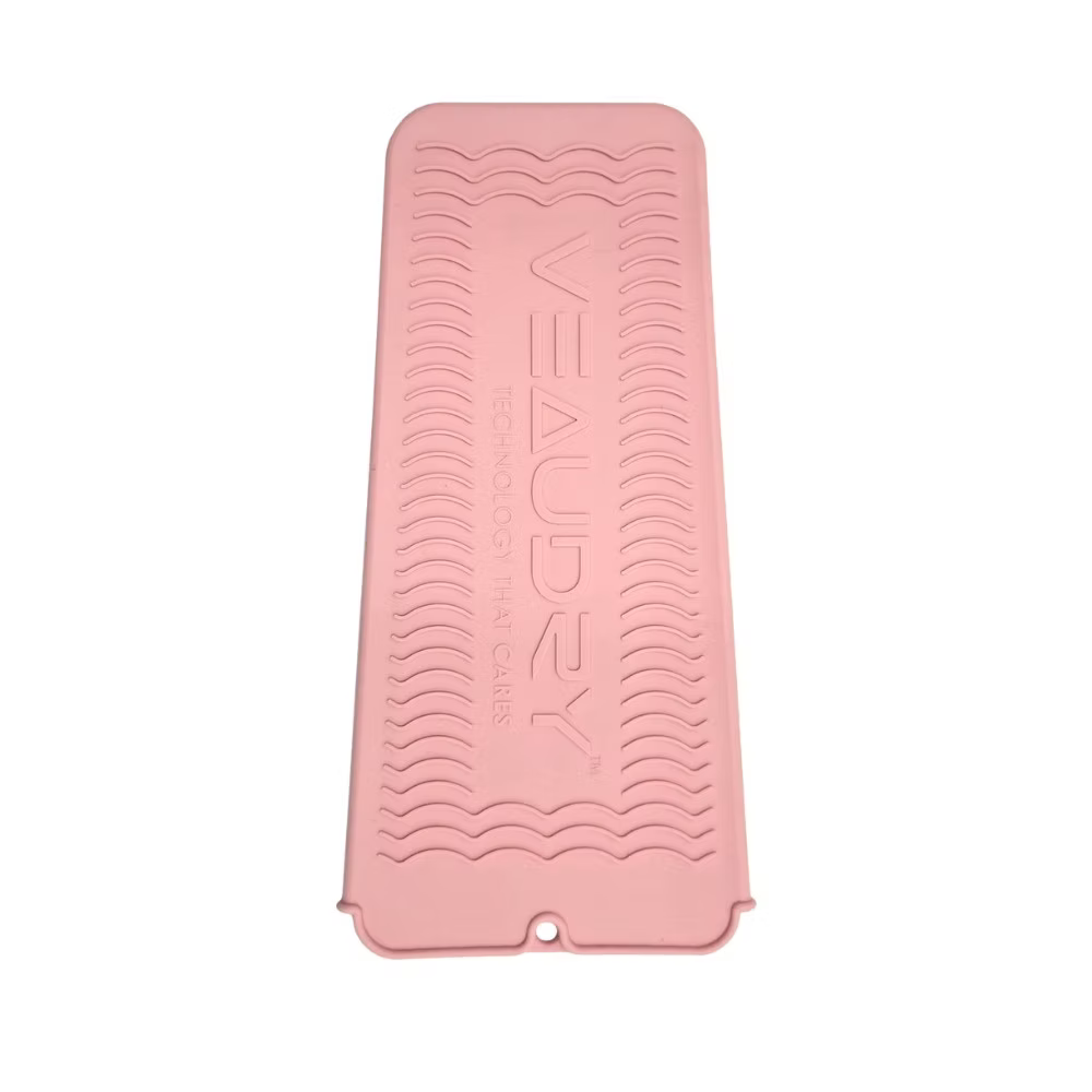 Veaudry Heat Mat & Pouch - Heat-Proof Travel Pouch in pink silicone with textured surface, ideal for protecting surfaces from hot styling tools.