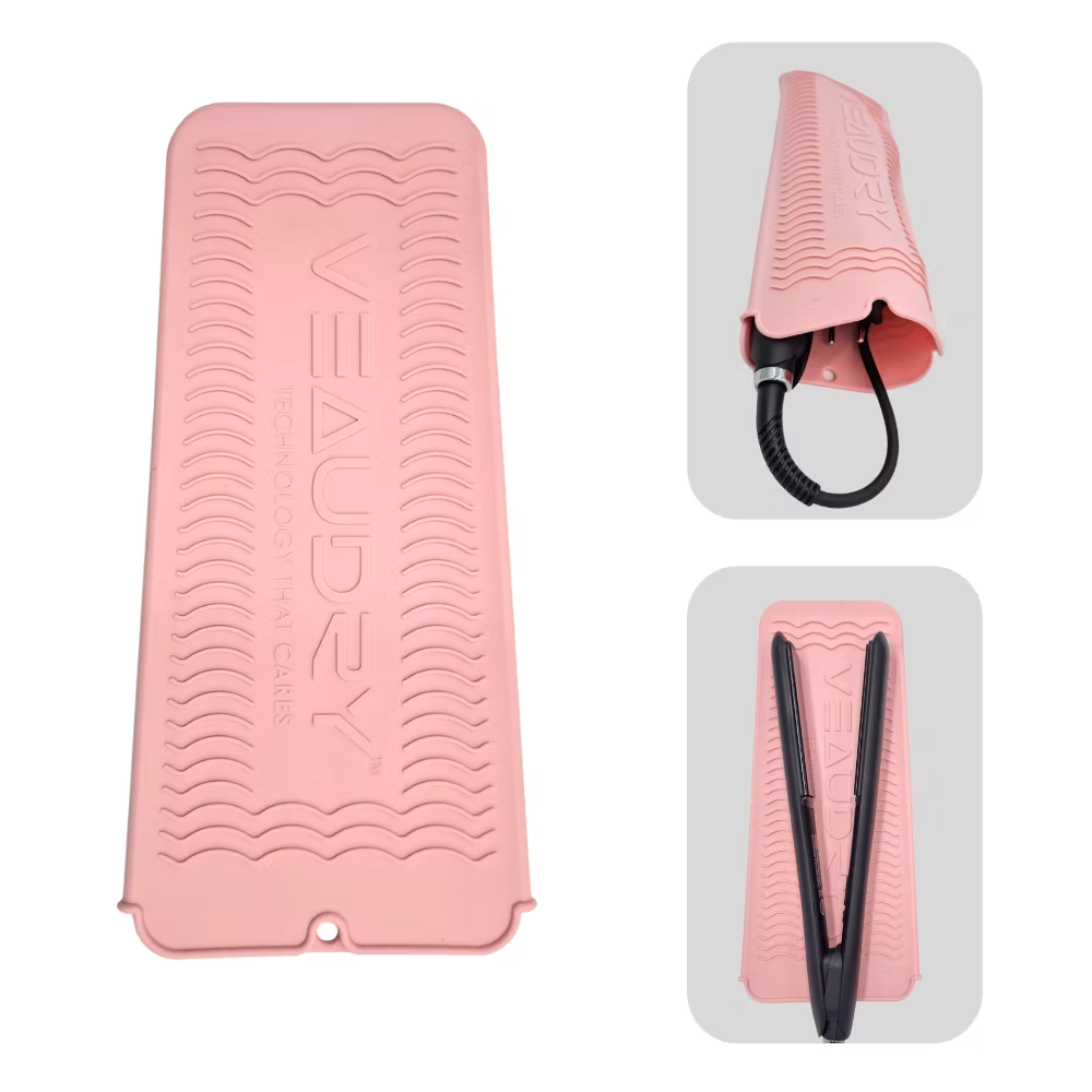 Veaudry Heat Mat & Pouch - Heat-Proof Travel Pouch shown in pink, used flat or wrapped around a hair straightener for safe storage and travel.