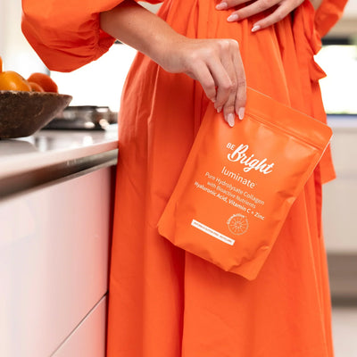 Be Bright Collagen Powder: Illuminate Your Skin. Hydrolysate Collagen for Radiant Skin & Health. Beauty Supplement. Orange Dress.