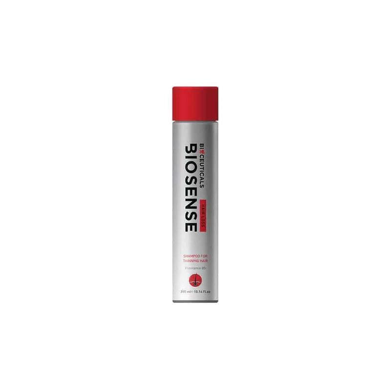 A spray of red paint on white; Biosense Bioceuticals Anti Hair Loss Shampoo 300ml for fuller hair