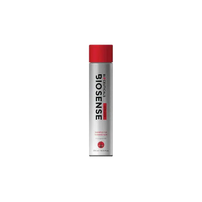 A spray of red paint on white; Biosense Bioceuticals Anti Hair Loss Shampoo 300ml for fuller hair