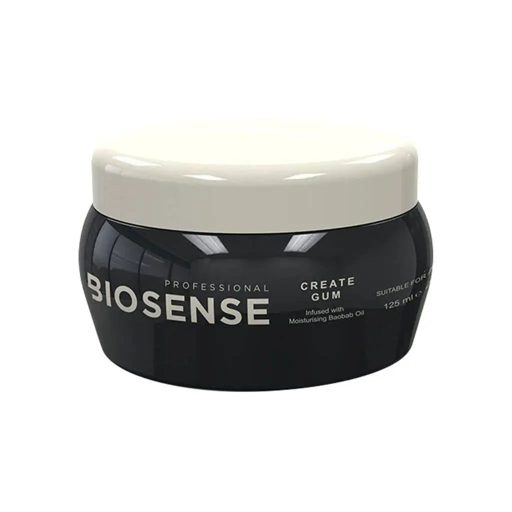 Black cosmetic jar with white lid labeled ’Biosense Create Gum 125Ml’ for hair styling