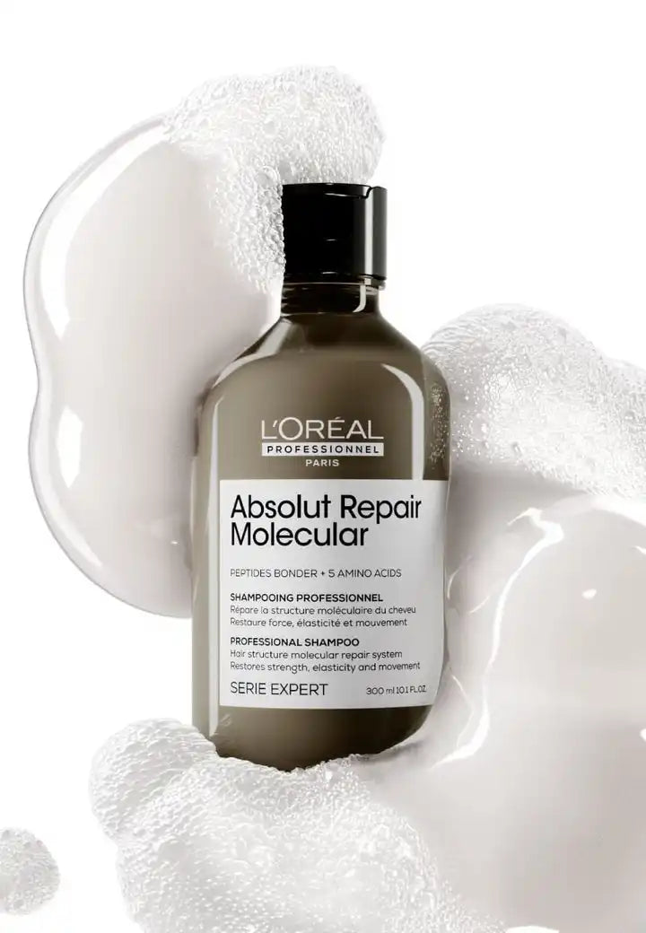 Bottle of L’Oreal Absolut Repair Molecular hair product.