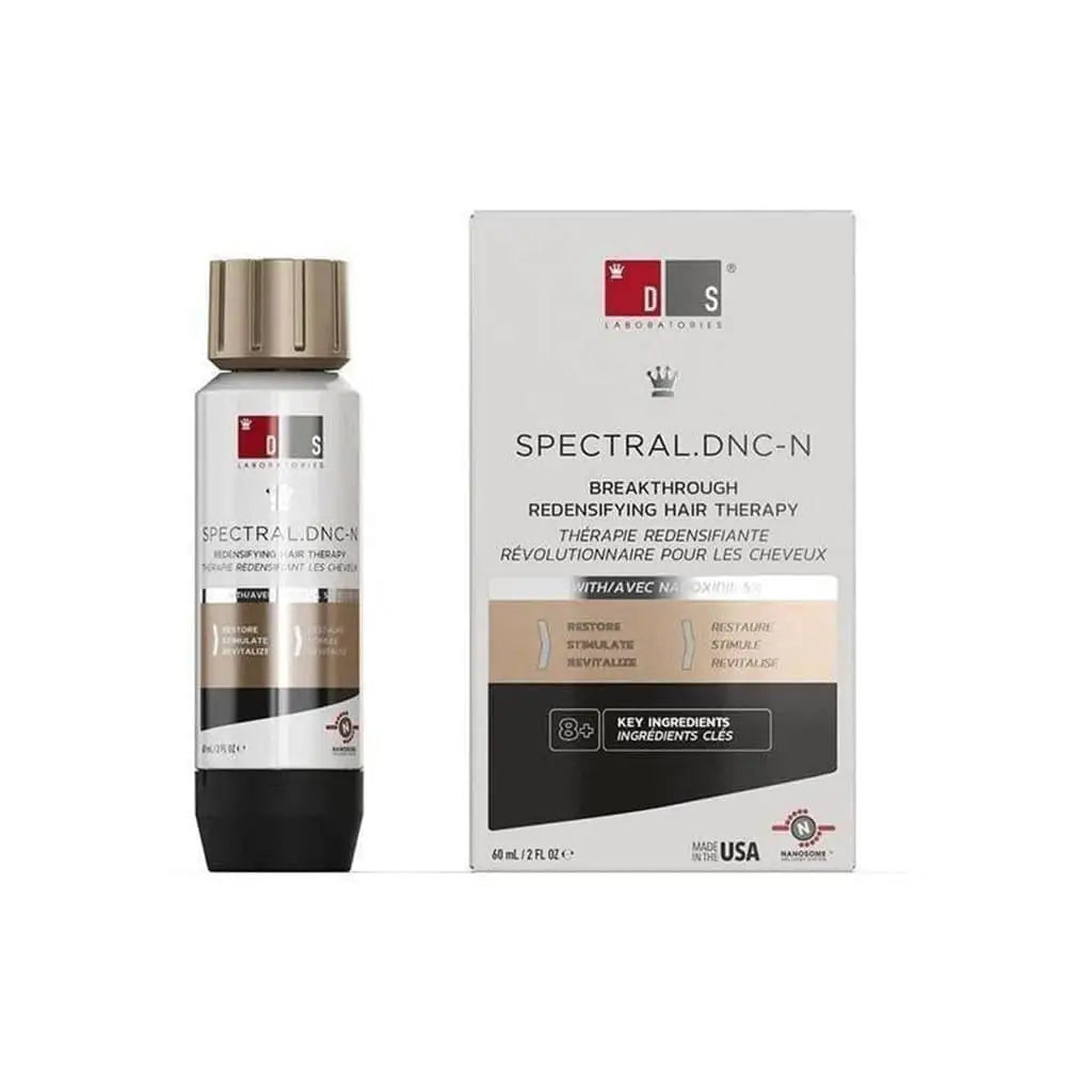 Hair treatment product called Spectral.DNC-N in a bottle with its packaging box.