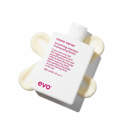 EVO Mane Tamer Smoothing Shampoo white bottle with pink text and creamy shampoo background
