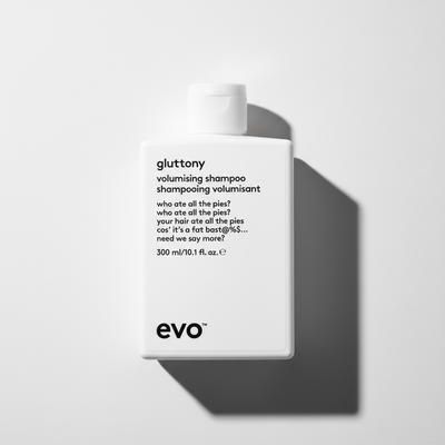 EVO Gluttony Volumising Shampoo in white bottle with minimalist black text for hair volume