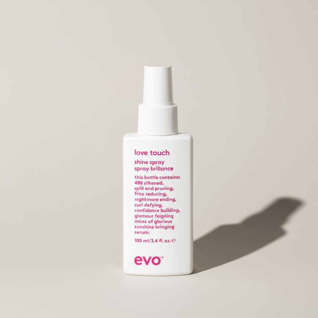 EVO love touch lightweight hair shine spray in white bottle with pink text for styling aid