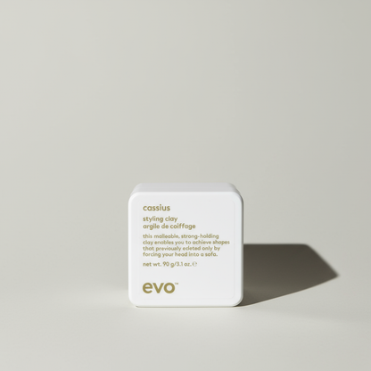 EVO Cassius strong hold hair clay for men in a white square container with gold text