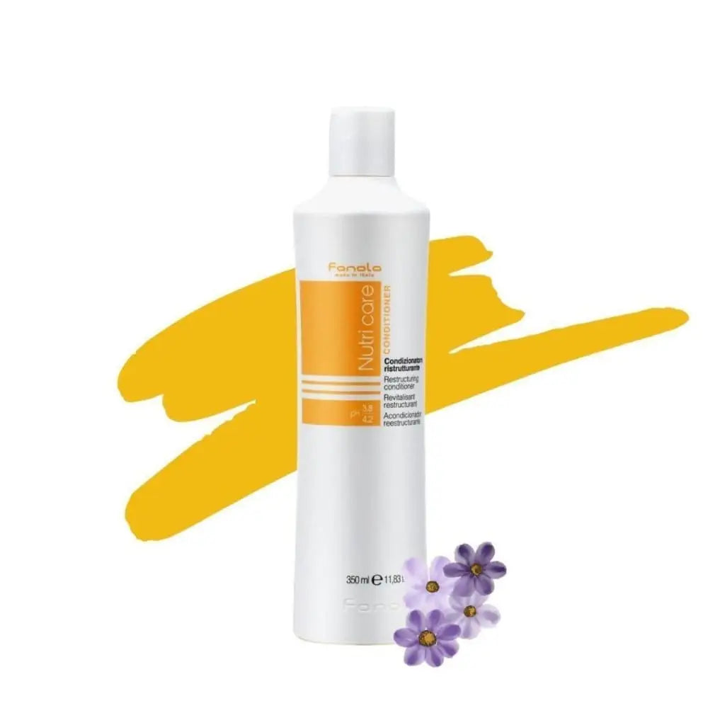 White bottle of hair care product with orange label and purple flower accents.