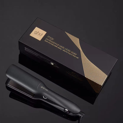 Black GHD Max Wide Plate Hair Straightener with packaging featuring gold accents