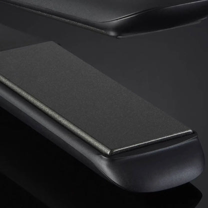 Sleek black armrest of the ghd Max Wide Plate Hair Straightener with smooth curves