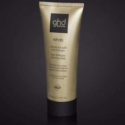 Gold-colored GHD Rehab Advanced Split End Therapy tube for heat protection and repair