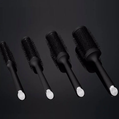 Set of black radial brushes with white handles for root lift, 25mm barrel size
