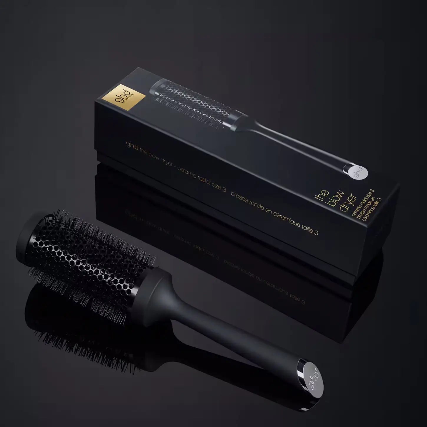 Black radial brush with sleek handle and bristles, 45mm barrel for curling and styling