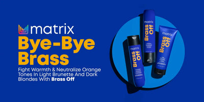 Hair care product line called ’Matrix Bye-Bye Brass’ featuring blue bottles against a circular blue background.