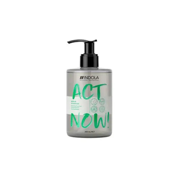 Bottle of Indola Act Now Repair Shampoo 300ml with a pump dispenser for damaged hair