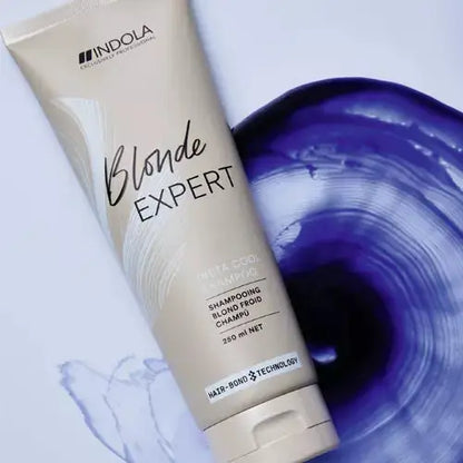 Indola Blonde Expert Insta Cool Shampoo: Purple shampoo for cool blonde tones. Neutralizes brassiness, 250ml size.