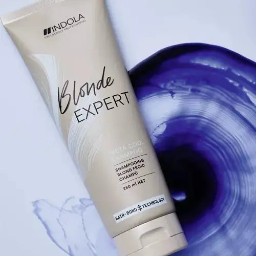 Indola Blonde Expert Insta Cool Shampoo: Purple shampoo for cool blonde tones. Neutralizes brassiness, 250ml size.