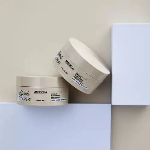 Indola Blonde Expert hair mask. Professional hair treatment for blonde hair. Blonde Expert Masque, two jars on display