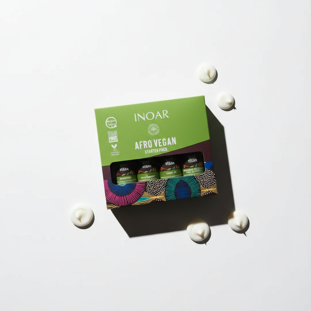 Inoar Afro Vegan hair care set starter pack with green box and cream dollops on white background