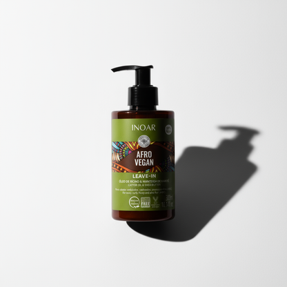 Inoar Afro vegan leave-in treatment for curly hair in brown pump bottle with green label