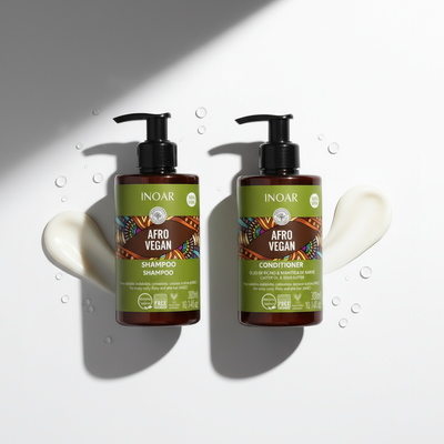 Inoar Afro Vegan shampoo and conditioner bundle with pump bottles and creamy texture on white background