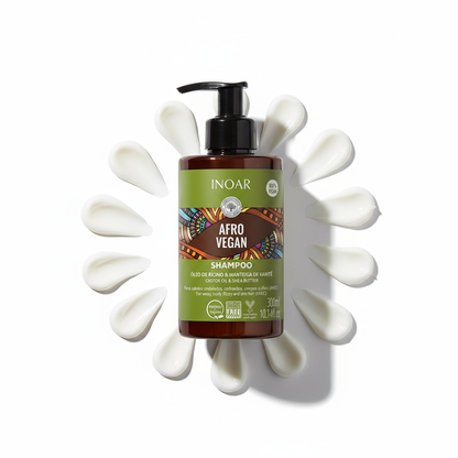 Inoar afro vegan shampoo for curls bottle with cream swirls on white background