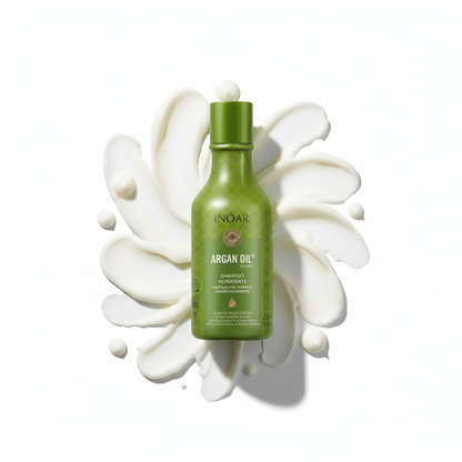 Inoar argan moisturizing shampoo green bottle with creamy white product background