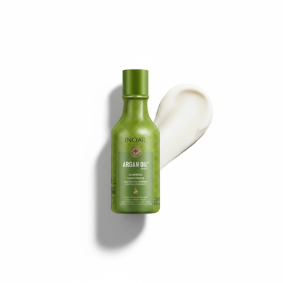 Inoar argan moisturizing shampoo green bottle with cream texture swatch on white background