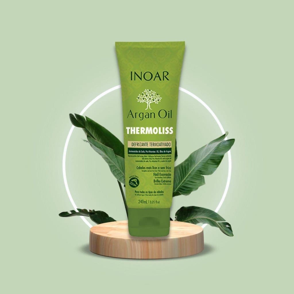 Inoar Argan Oil Thermoliss Anti-Frizz Styling Balm 240ml on a green background