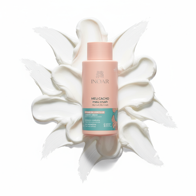 Inoar My Curl My Crush Combing Cream leave in cream bottle placed on white cream texture background