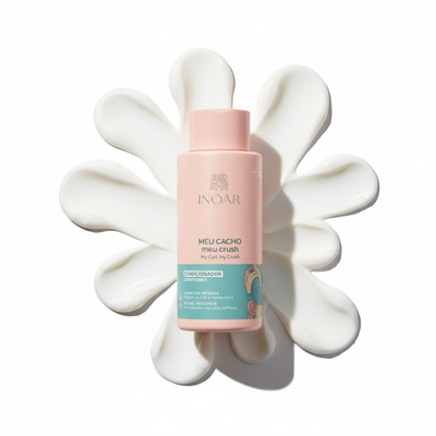 Inoar My Curl My Crush Conditioner bottle with creamy conditioner spread in flower shape behind it