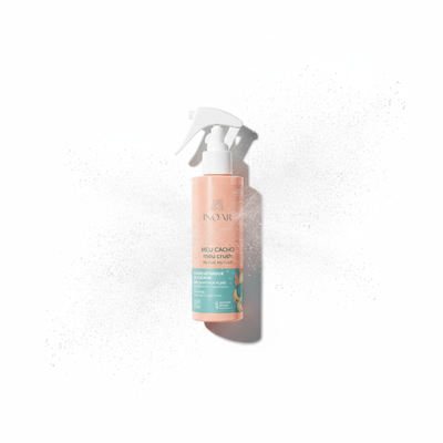 Inoar My Curl My Crush Curl Activator Spray in a pink and teal bottle with a white spray nozzle on a white background
