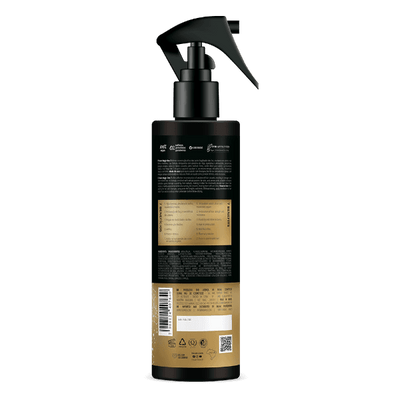 Back view of Inoar Magic One 7 Reconstructor Spray bottle with black and gold design and spray nozzle