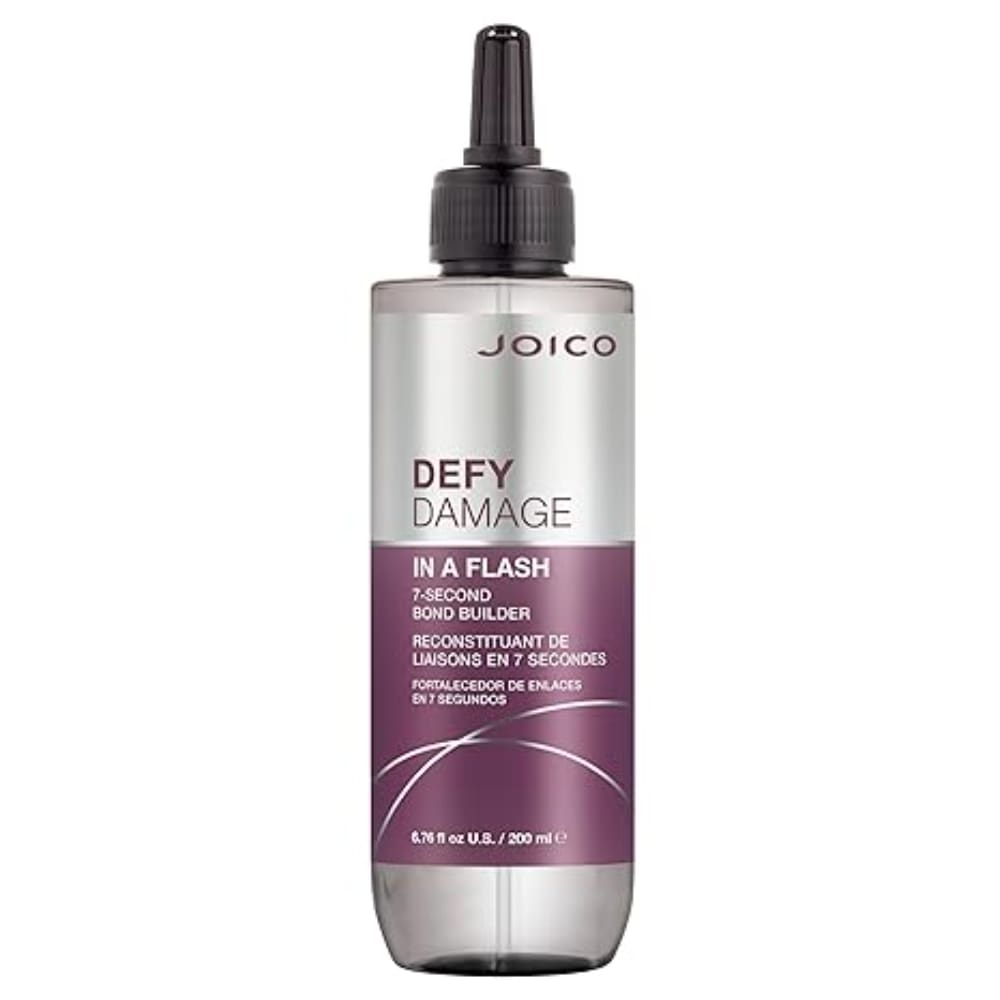 Joico Defy Damage In A Flash hair care product bottle in purple and silver design