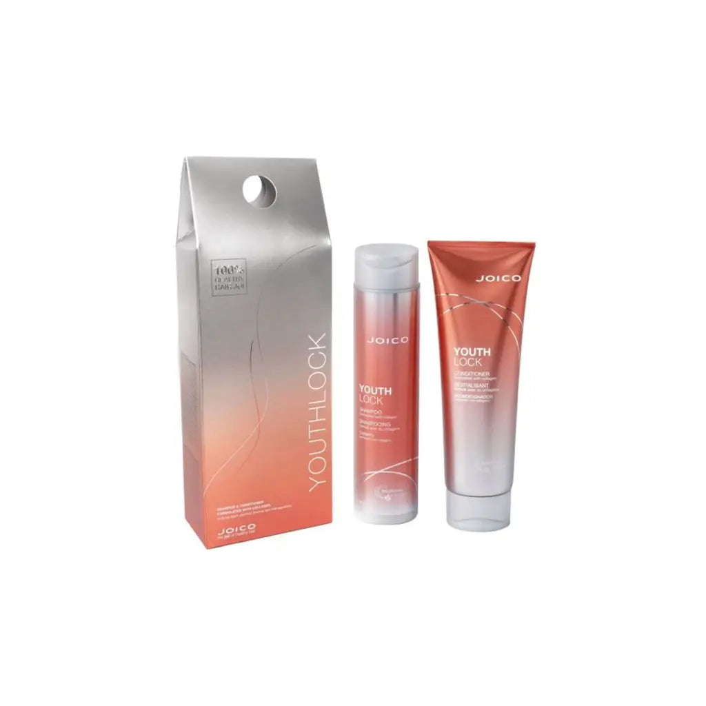 Skincare product set with silver and coral gradient packaging.