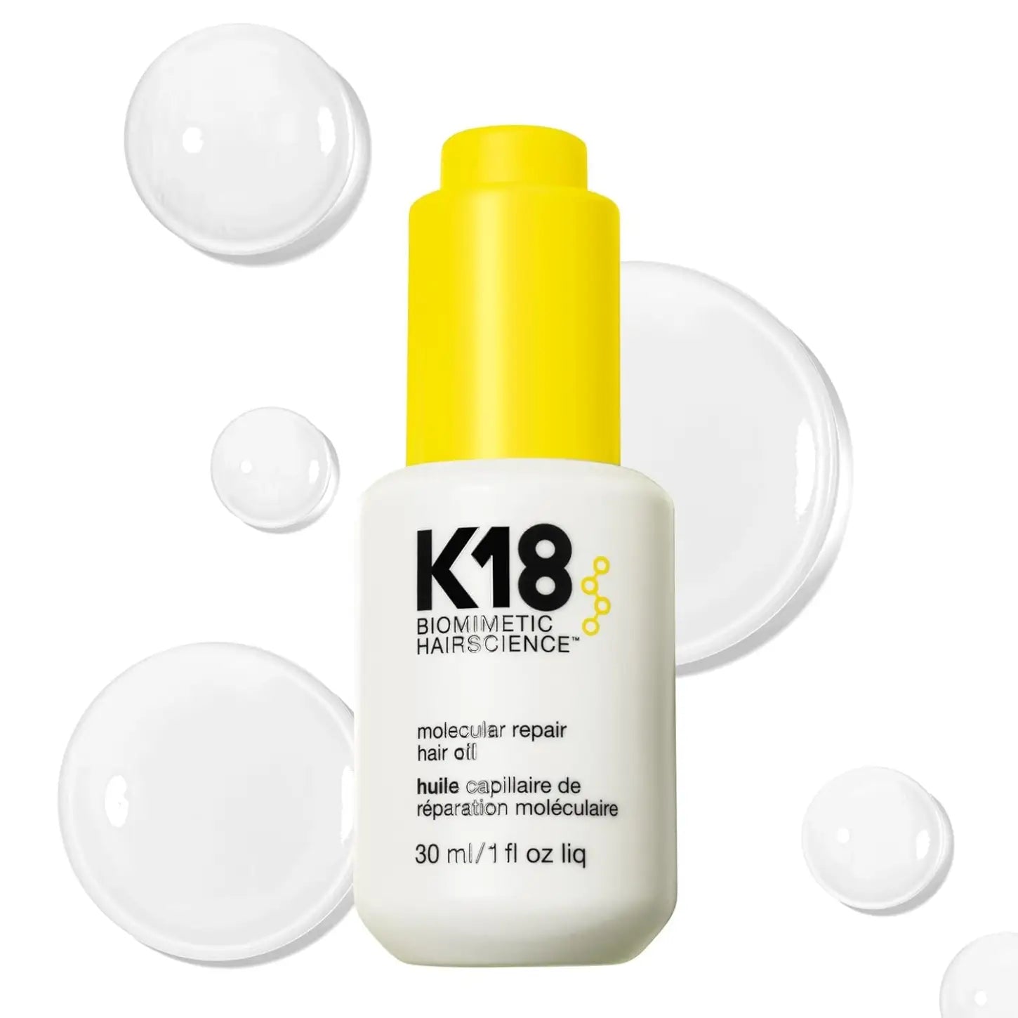 K18 Molecular Repair Oil 30ml for deep bond restoration, transforming damaged hair into stronger, healthier locks.