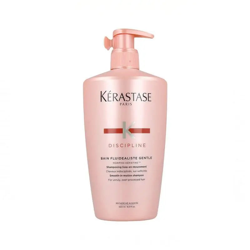 Pink bottle of Kérastase Discipline Bain Fluidealiste Gentle Shampoo 500ml with pump dispenser