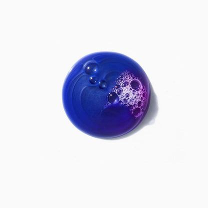 Blue spherical object with purple and pink patterns, Kerastase Blond Absolu Bain Ultra-Violet