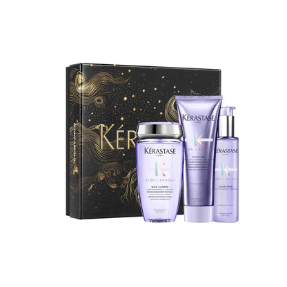 Gift set of Kérastase hair care products in purple packaging.