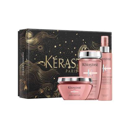 Gift set of Kérastase hair care products in pink packaging.